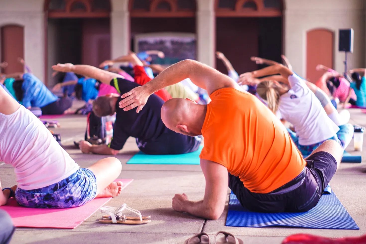Seekers practicing yoga together in a group class
